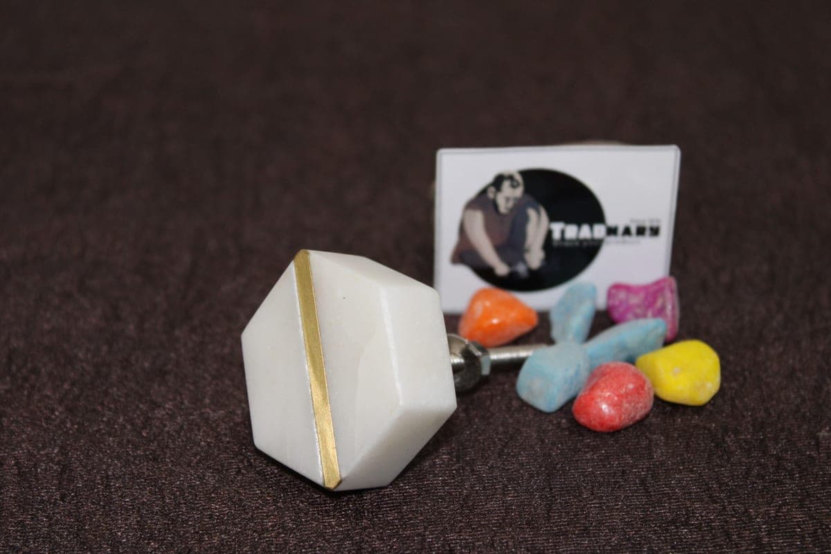 White Marble and Brass Knob