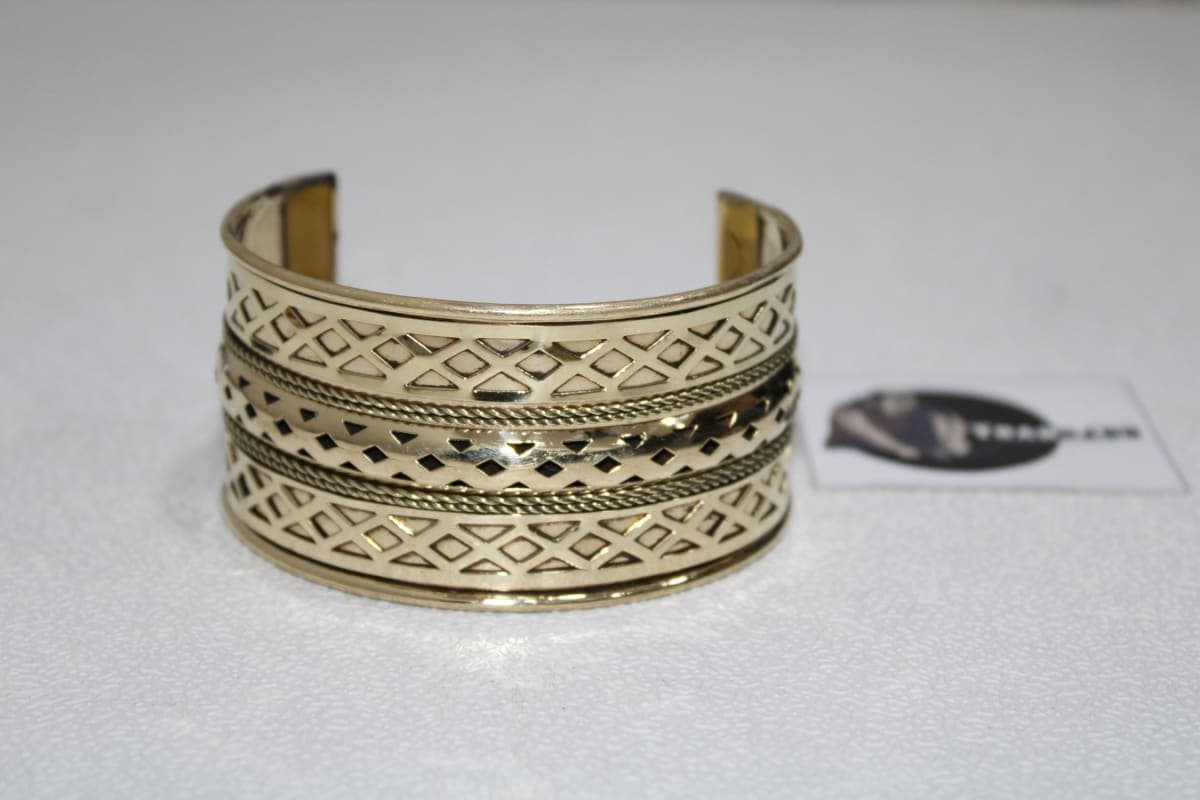   Floral Cut-Out Design In Brass Cuff