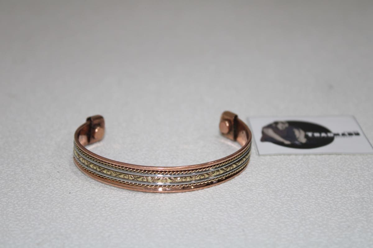 Magnetic Copper Cuff With Engraved Brass Design