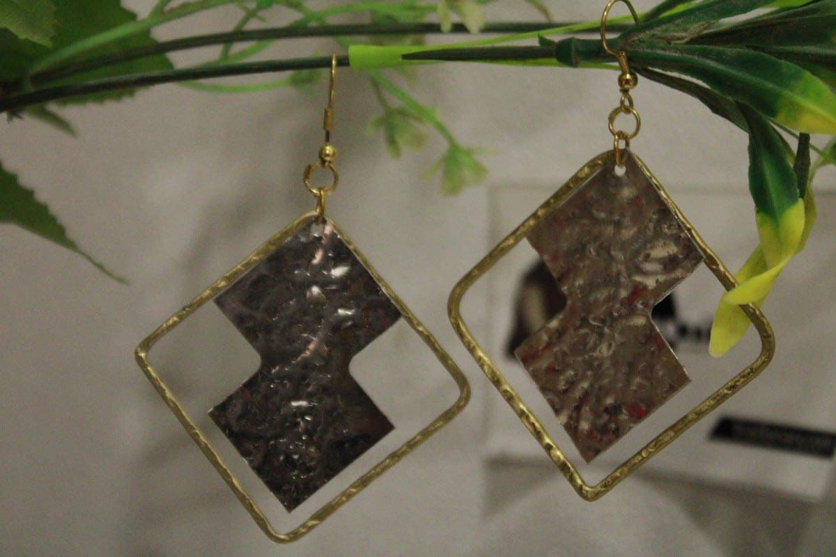 Silver Coated Earrings In Pipe Design