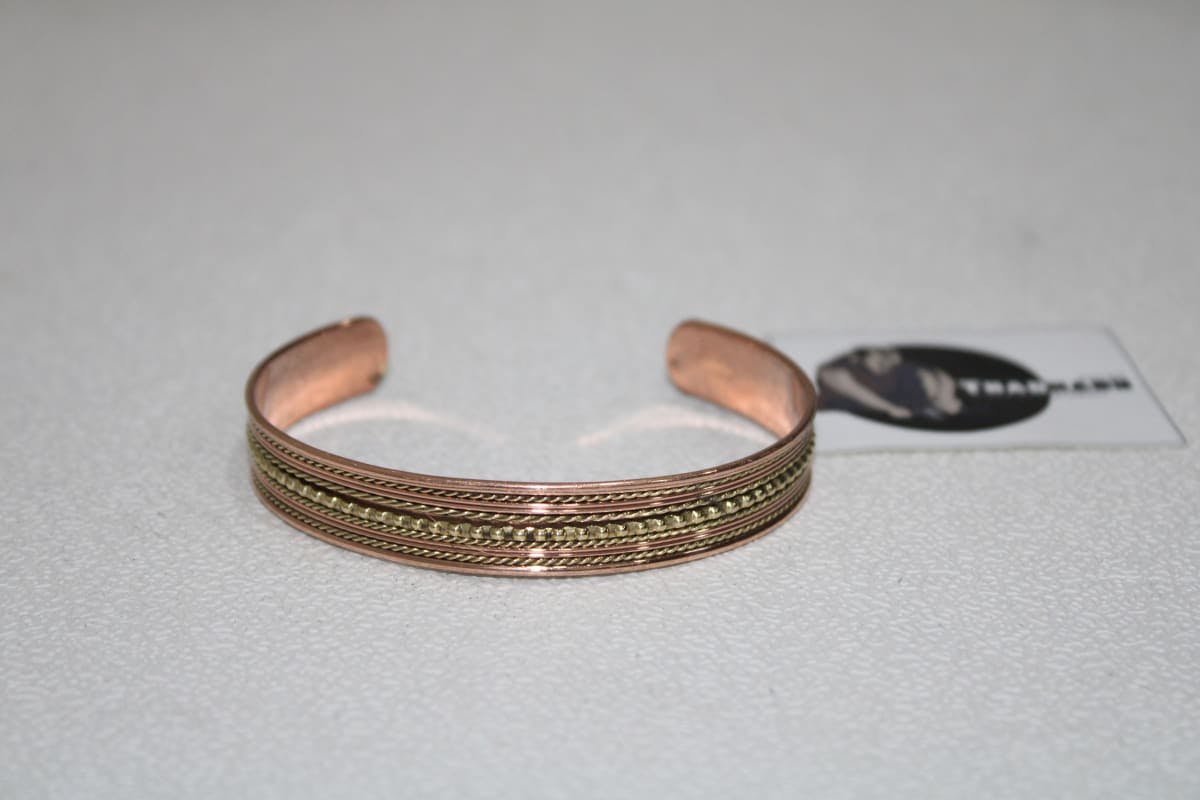 Copper Cuff With One Thick And Four Thin Brass Rope Design