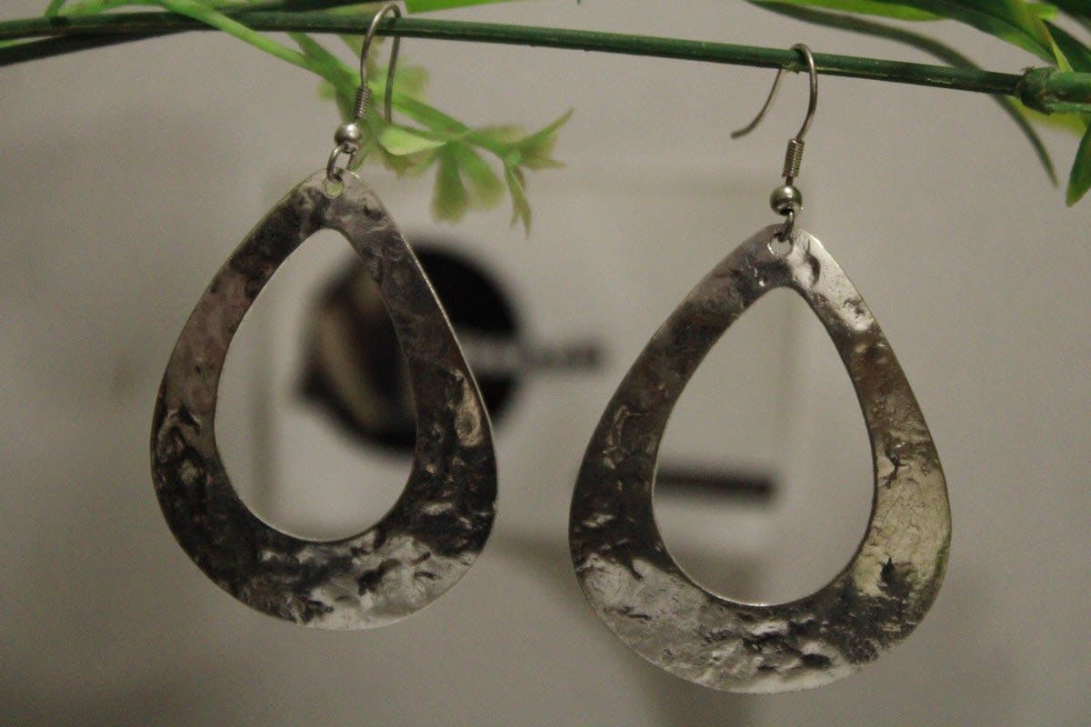 Silver Coated Earrings In Oval Shape